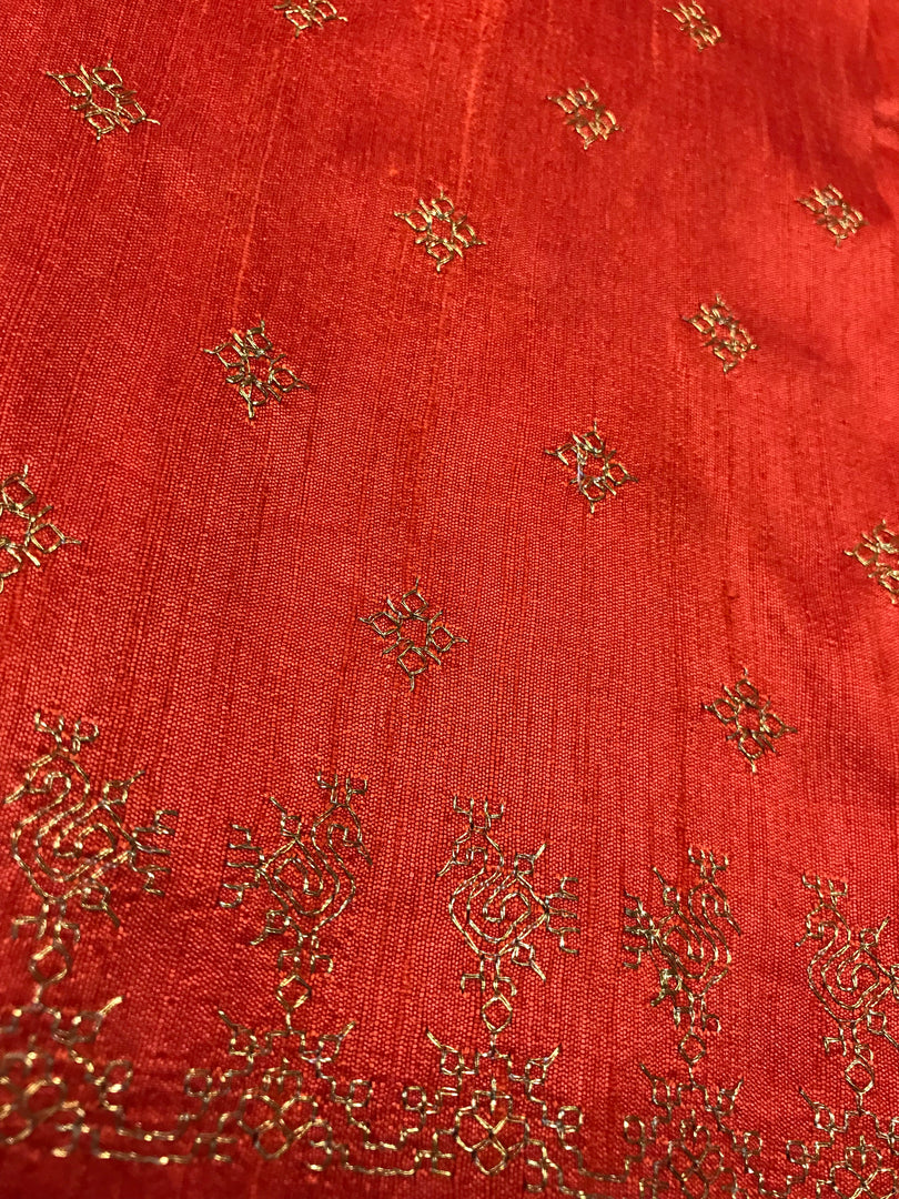 Orange peacock kasuti blouse close-up showing peacock embroidery work