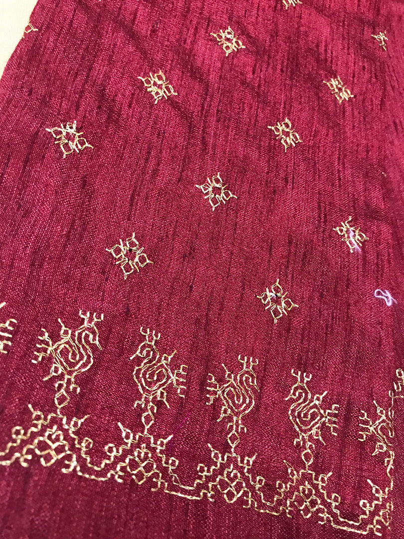 Maroon peacock kasuti blouse showing close-up embroidered peacock motif
