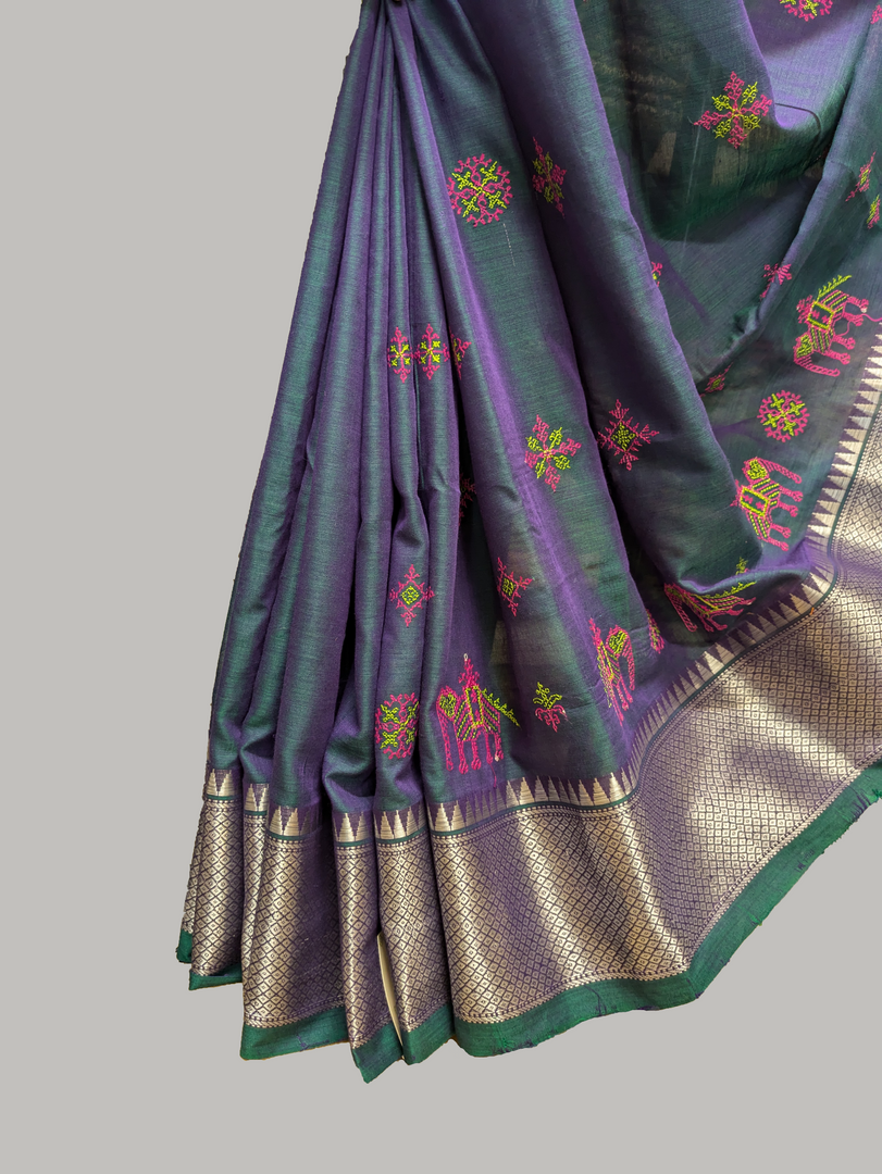 Embroidery close-up of neeli aane kasuti cotton saree fabric