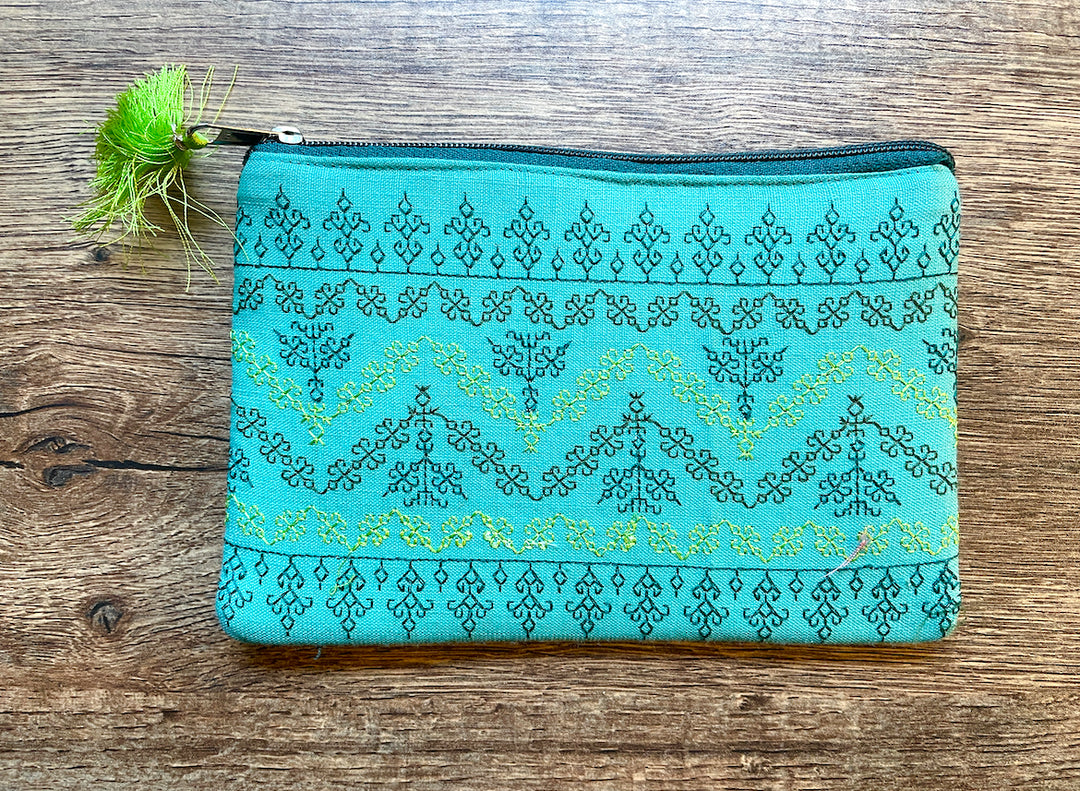 Green maharani purse with embroidered detailing front